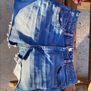 three pair of American eagle shorts